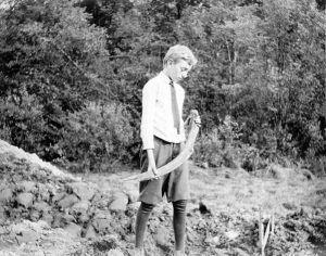 Frederick B. Cook, the 12 year-old son of Hill-Stead farm manager, Allen B. Cook, holding a bone “representing the first bone discovered” when the mastodon remains were unearthed at Hill-Stead in August 1913.